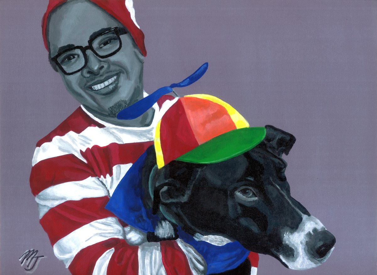 A smiling bearded man in glasses and a red and white striped shirt holding a black and white dog in a colourful cap, on a lavender ground