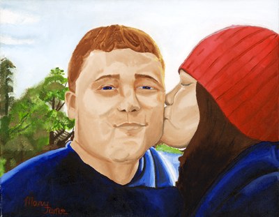 A man in a blue shirt with a woman in a red hat leaning in to kiss his cheek, under a pale sky